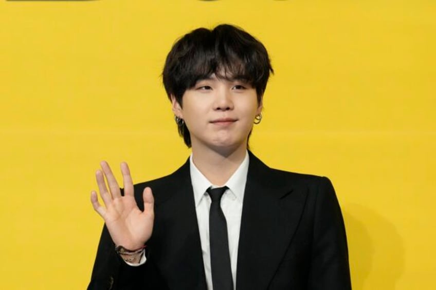 bts member suga begins alternative military service in south korea