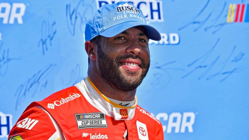 bubba wallace pushes back on darfs after making next round of nascar playoffs pole for texas race