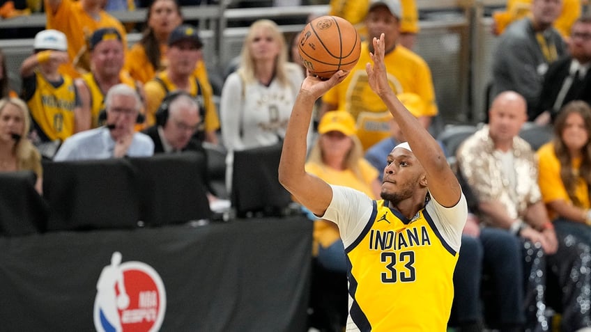 Myles Turner shoots the basketball