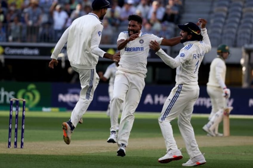 India celebrates another Australian wicket in the first Test