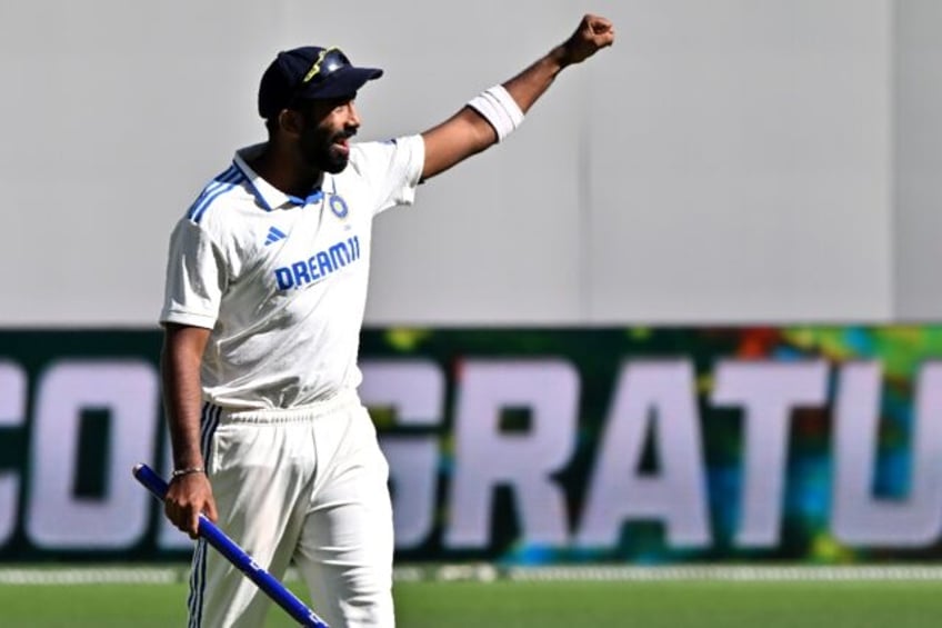 India captain Jasprit Bumrah celebrates victory in the first Test against Australia