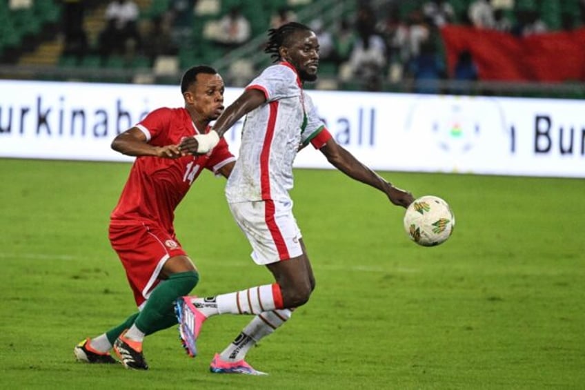 Bertrand Traore (R) scored as Burkina Faso beat Burundi 2-0 to qualify for the 2025 Africa