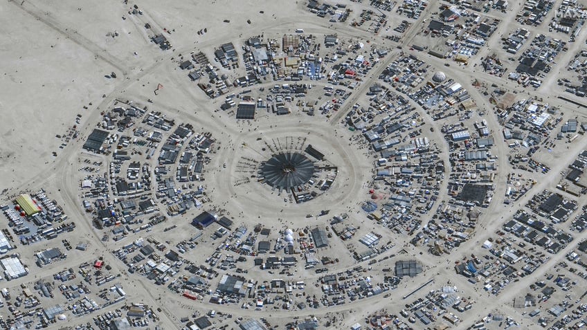 burning man attendees death unrelated to torrential rain flooding report