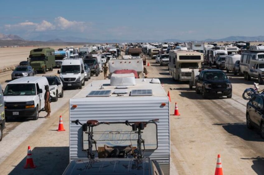 burning man is ending but the cleanup from heavy flooding is far from over