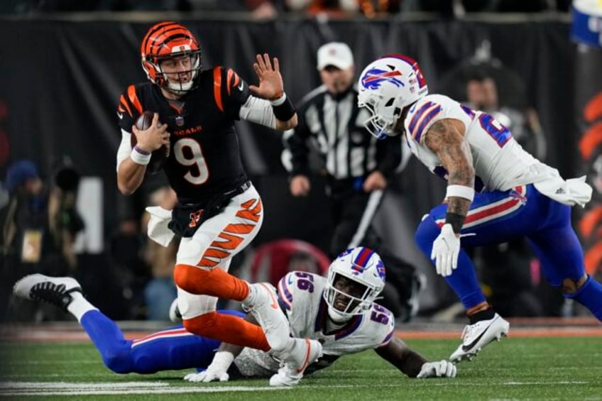 burrow passes for 348 yards and 2 tds and bengals defense clamps down on bills in 24 18 win