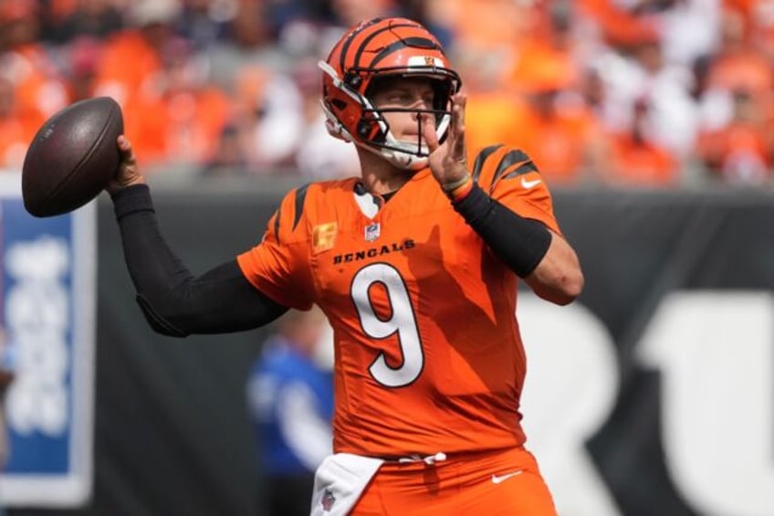 Cincinnati quarterback Joe Burrow unleashes a throw during the Bengals' NFL loss to New En