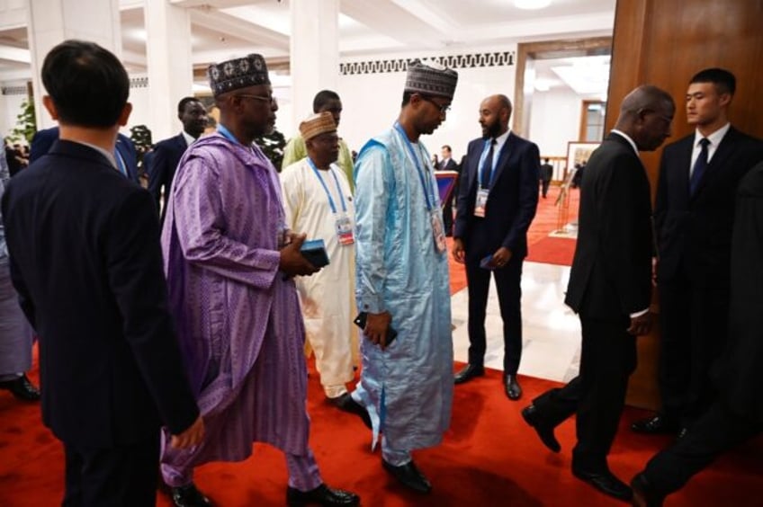 Delegates arrive for the opening ceremony of the Forum on China-Africa Cooperation in Beij