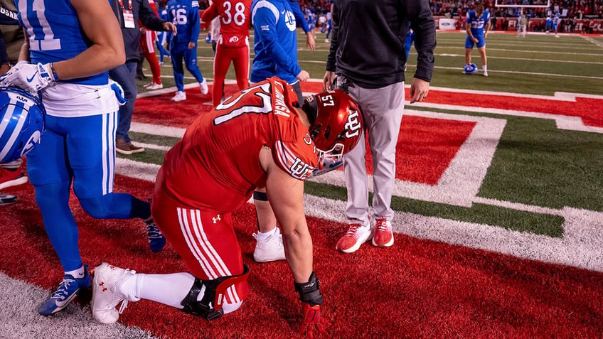 Utah defensive tackle Keanu Tanuvasa reacts