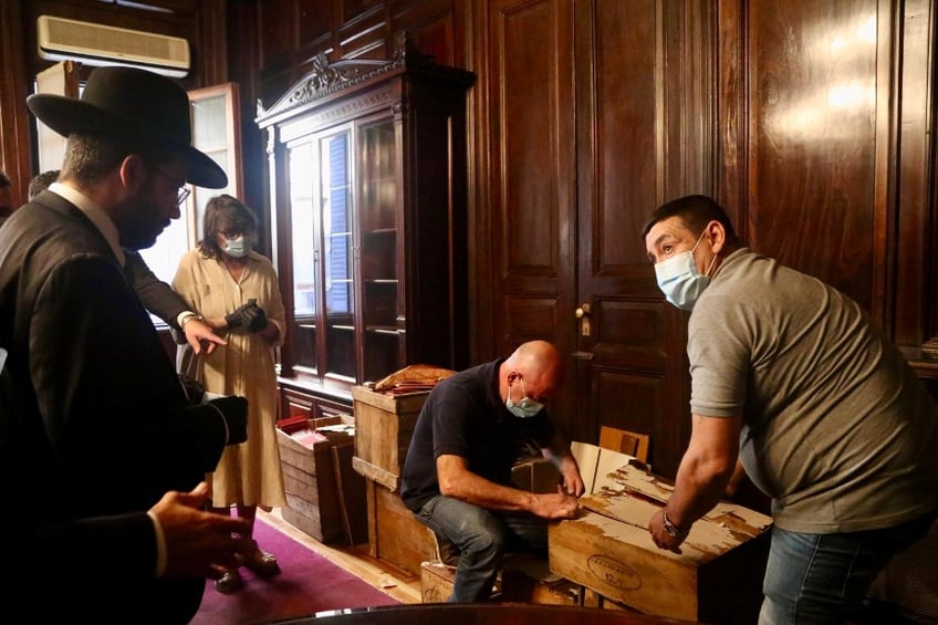 Investigators inspecting the inventory of the material found. Credit: Argentina Supreme Court