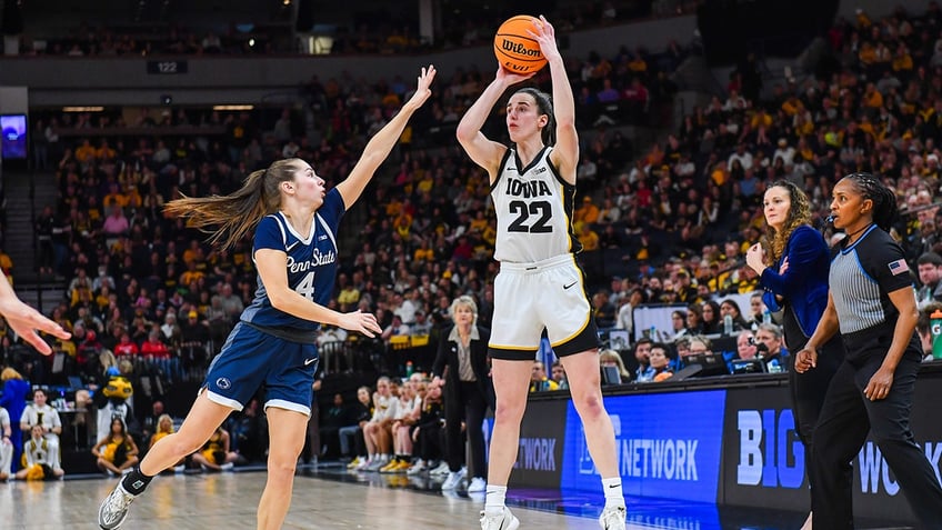 Caitlin Clark shoots three-pointer