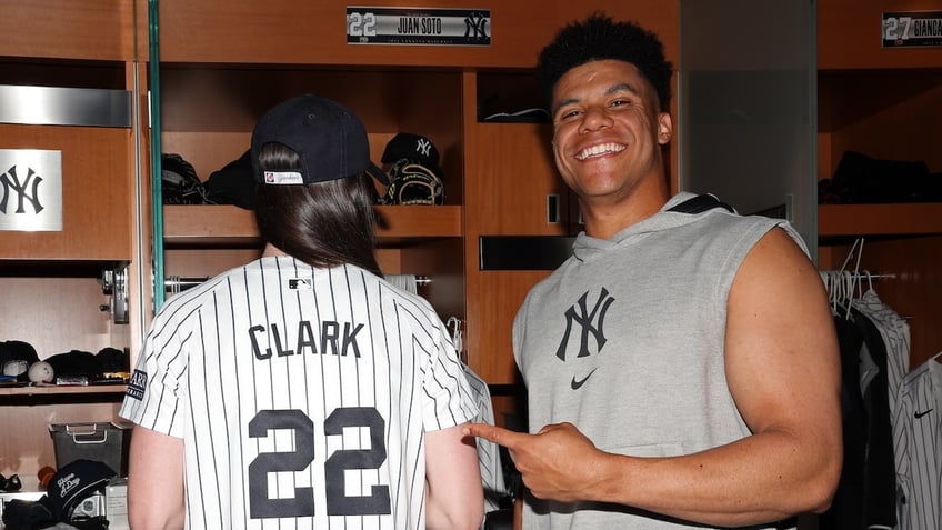 Caitlin Clark and Juan Soto pose.