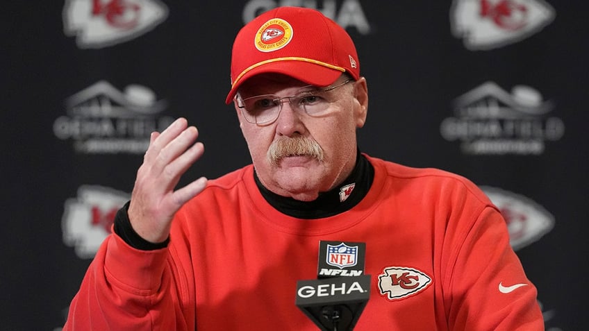 Andy Reid talks to reporters