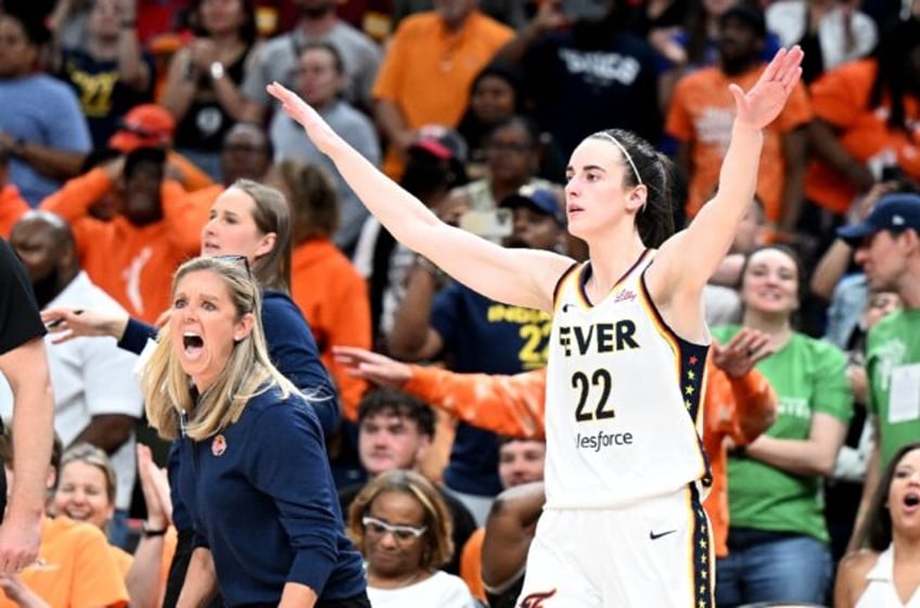 Caitlin Clark celebrates after her 30-point performance in Indiana's win over Washington o