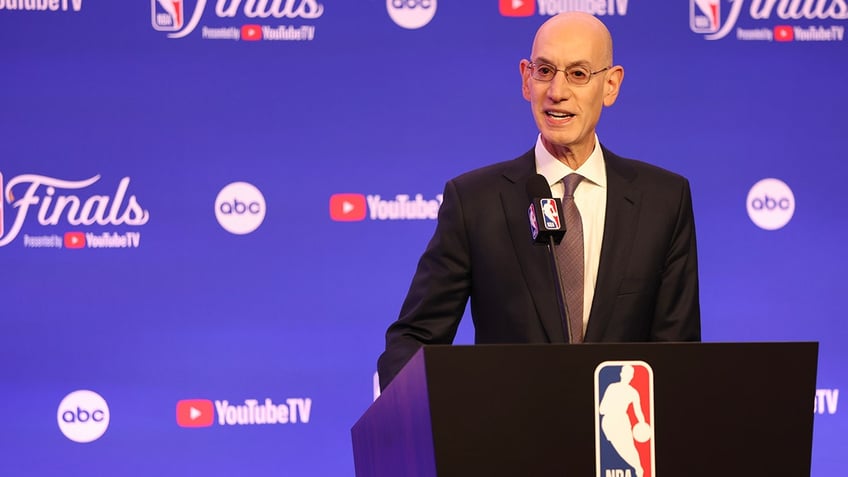 Adam Silver talks to reporters