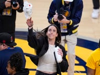 Caitlin Clark revs up Pacers fans with pregame playoff appearance in IndyCar replica