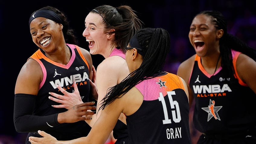 Caitlin Clark celebrates with Team WNBA