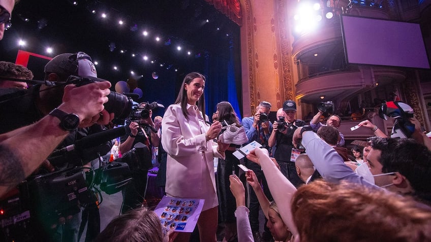 Caitlin Clark signs autographs