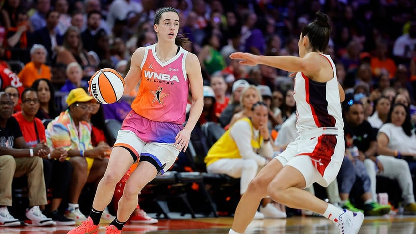 Caitlin Clark dribbles at All-Star