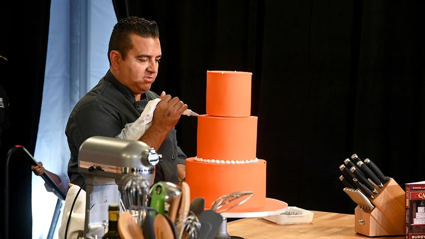 cake boss star buddy valastro has his kids cleaning toilets says it helps them gain respect