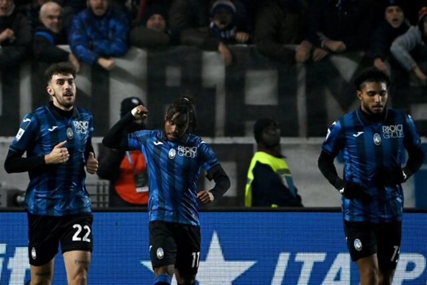 Ademola Lookman celebrates his second goal against AC Milan