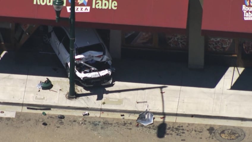 california car slams into pizzeria after road rage shooting incident police