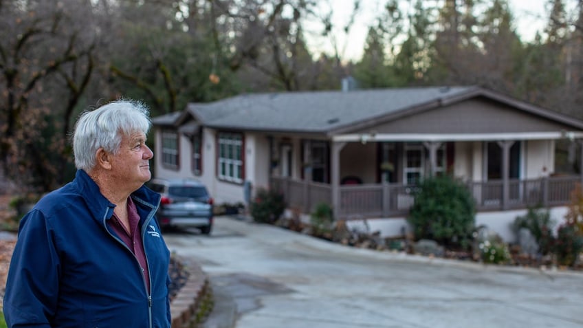 George Sheets in front of Tahoe home