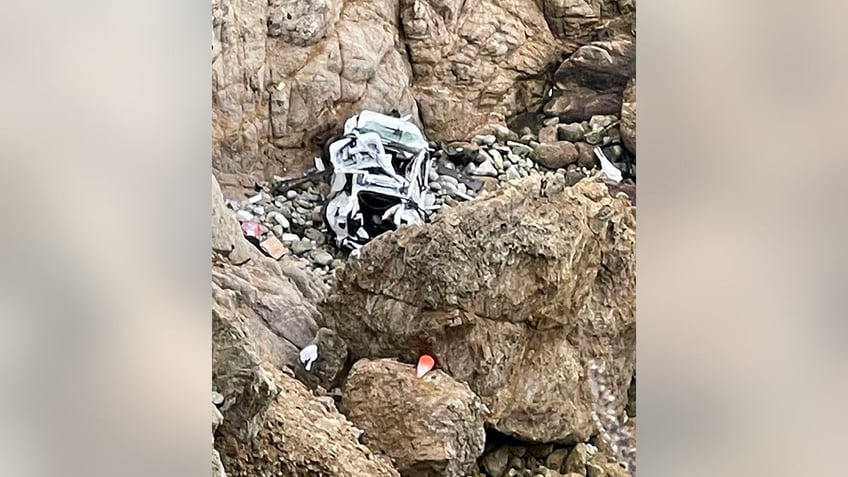 tesla crashed over california cliff