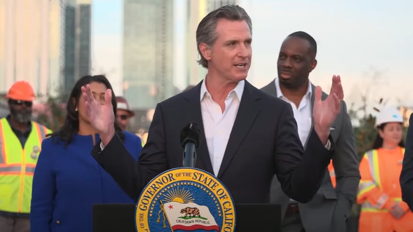 Gov Gavin Newsom speaking at an event