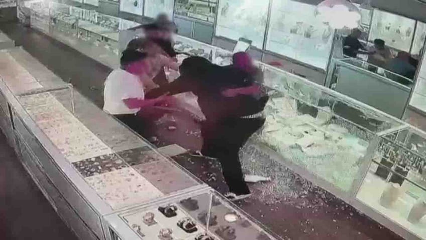 california jewelry store owners fight back during attempted smash and grab by suspect in trump mask