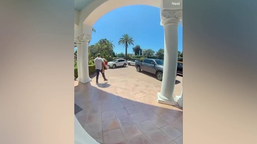 california mans leisurely stroll into home to allegedly steal hermes blankets worth 5k each caught on video