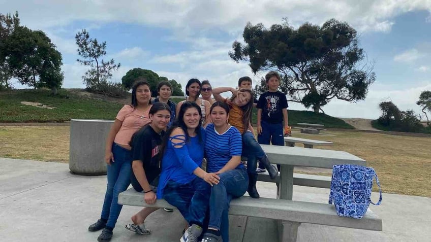 Maria Guadalupe Ramos Velasco pictured with her children