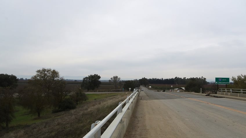 An empty dirt road.