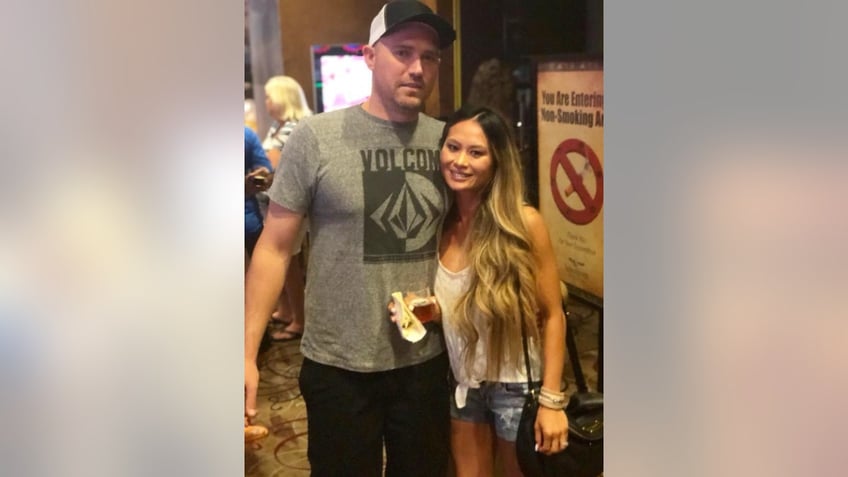 Nikki Saeleen-McCain (right) poses with her husband, Tyler McCain (left)