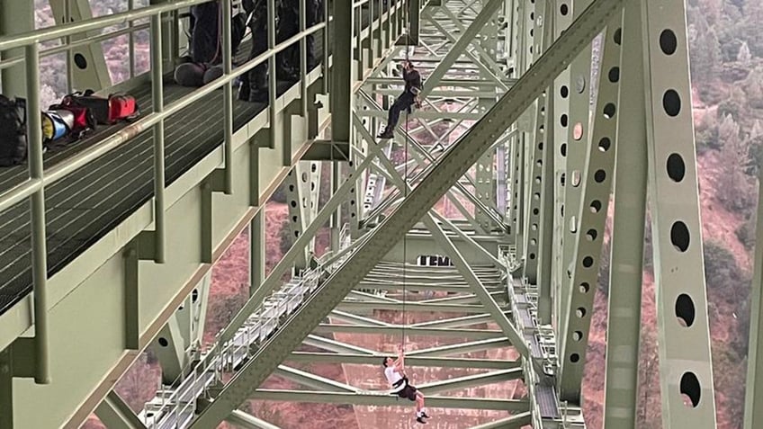 california sheriff releases image showing rescue of teen dangling 700 feet up on states highest bridge