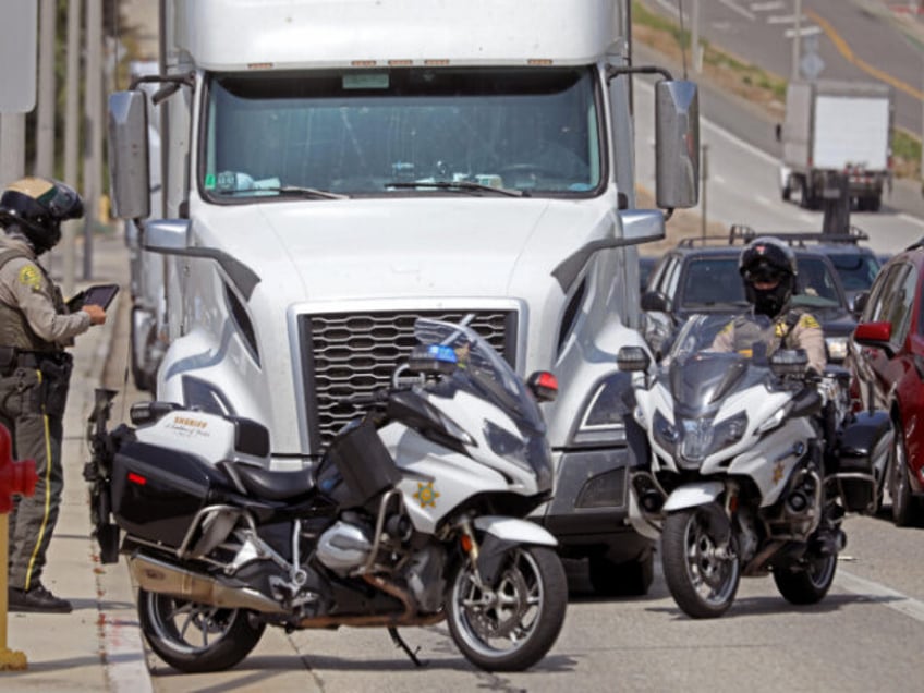 MALIBU, CA - MAY 8, 2024 - Sheriff deputies pulls over a truck for a traffic violation a f