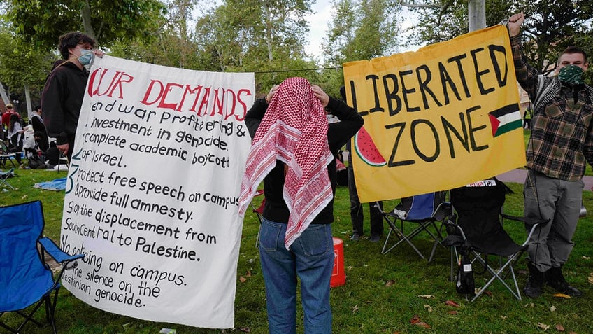 Protesters with signs