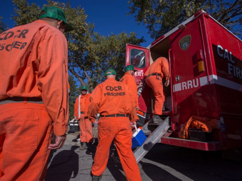 Prisoners at Oak Glen Conservation Camp leave the minimum security prison for work deploym