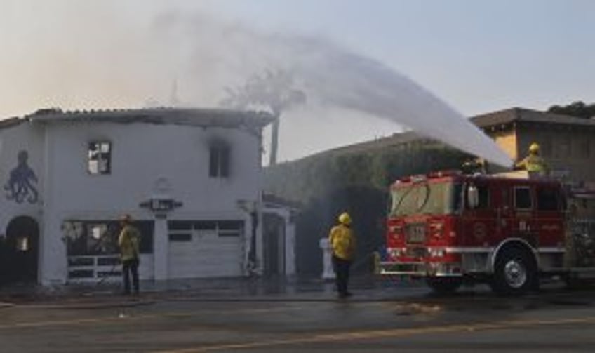 California wildfires remain largely uncontained amid Red Flag Warning extensions