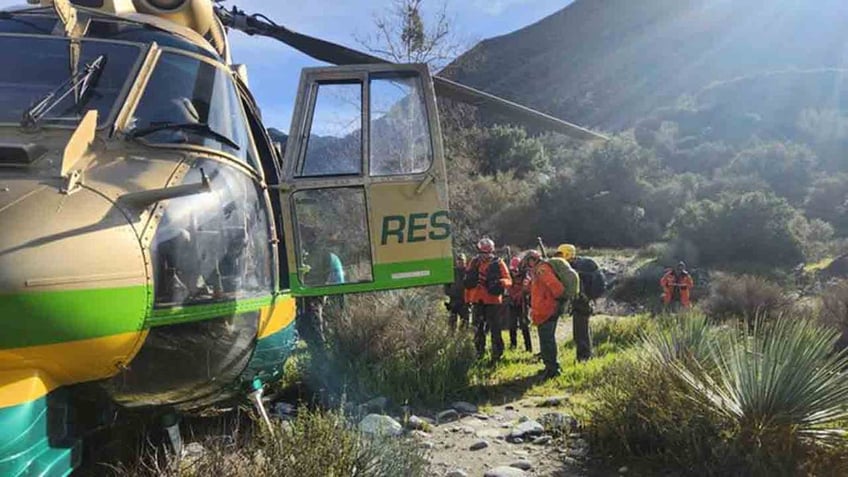 search and rescue team and helicopter