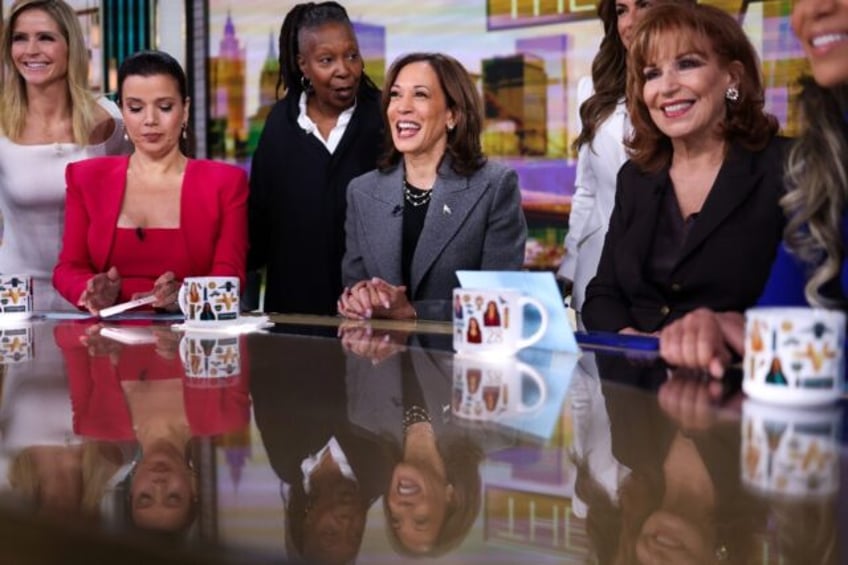 US Vice President Kamala Harris (C) appeared on ABC television show "The View" where she s