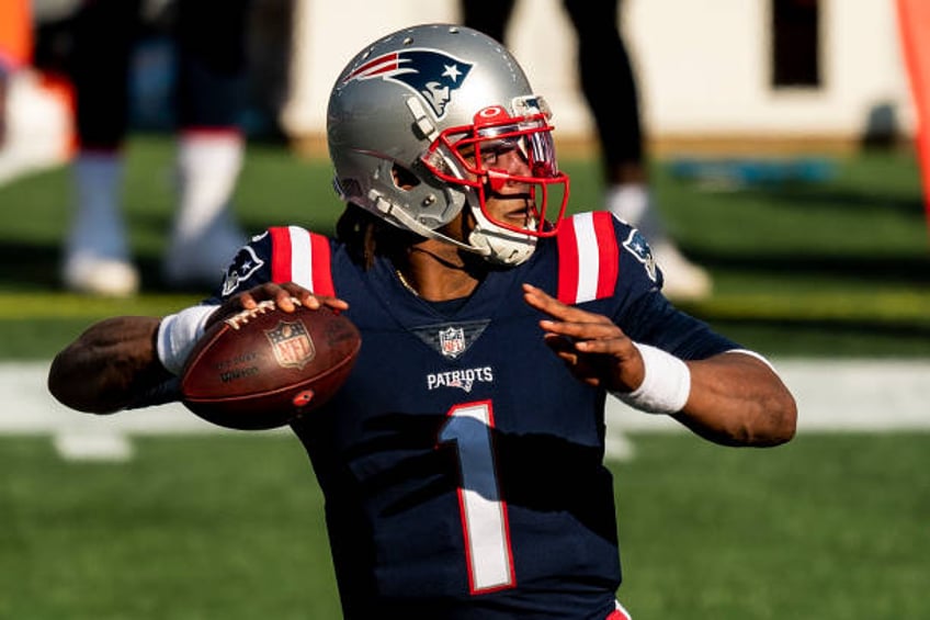 Cam Newton of the New England Patriots throws during the second half of a game against the Denver Broncos at Gillette Stadium on October 18, 2020 in...