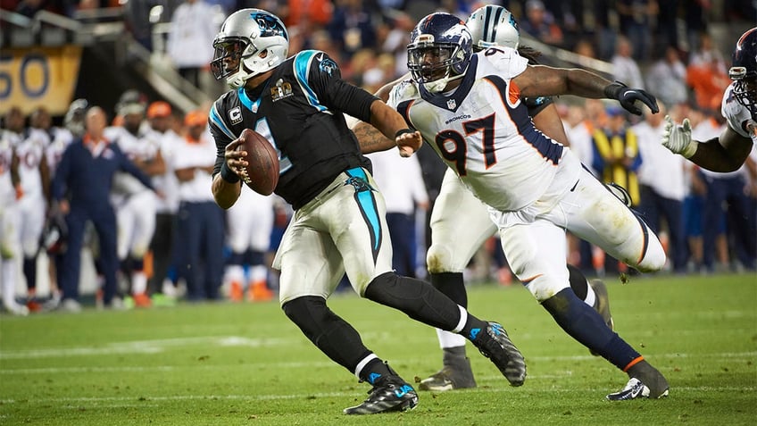 Malik Jackson chases Cam Newton