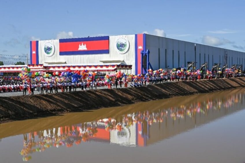 People attend the ground breaking ceremony of the Funan Techo Canal in Kandal province in