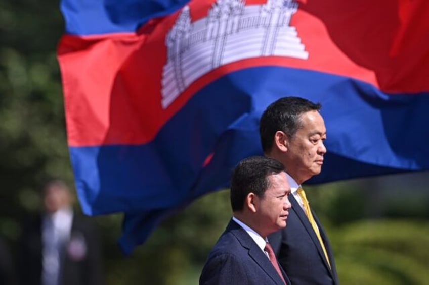 Cambodia's Prime Minister Hun Manet (front, with Thailand's Srettha Thavisin) took over after his father Hun Sen stepped down following nearly four decades in power