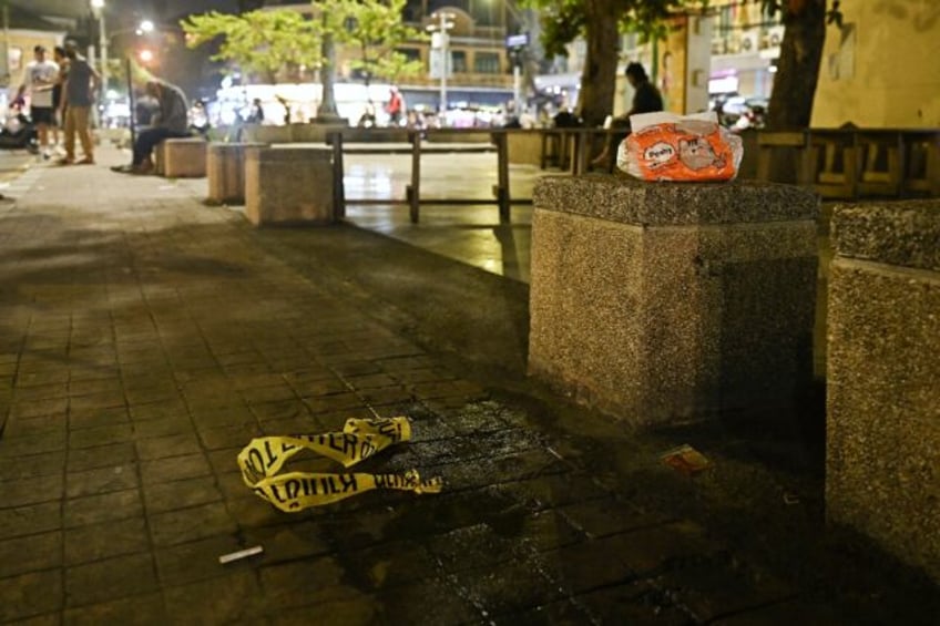 Police tape at the site where Lim Kimya was gunned down in Bangkok