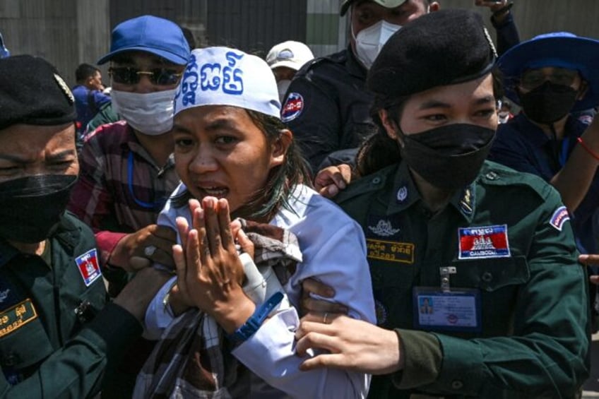 Campaigners from one of Cambodia's few environmental activism groups were sentenced to bet