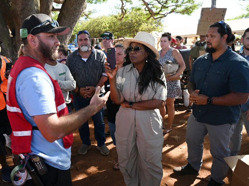 camera crew accompanying oprah winfrey turned away from maui shelter