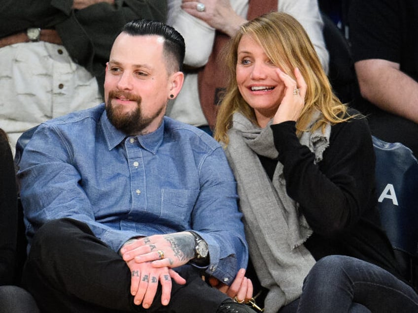 LOS ANGELES, CA - JANUARY 27: Benji Madden (L) and Cameron Diaz attend a basketball game between the Washington Wizards and the Los Angeles Lakers at Staples Center on January 27, 2015 in Los Angeles, California. (Photo by Noel Vasquez/GC Images)