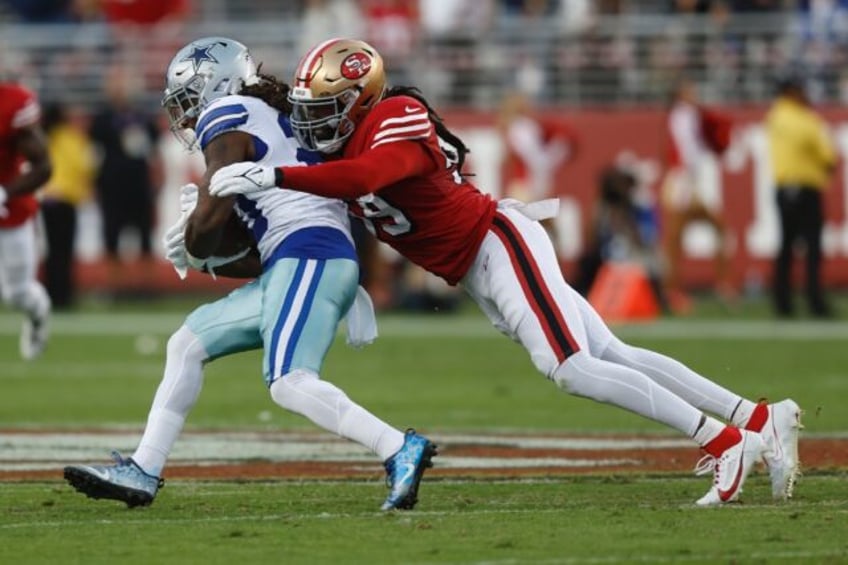 San Francisco's De'Vondre Campbell (right) is unlikely to play for the 49ers again after r