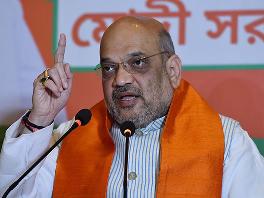 The national president of the Bhartiya Janta Party (BJP) Amit Shah addresses the media pri